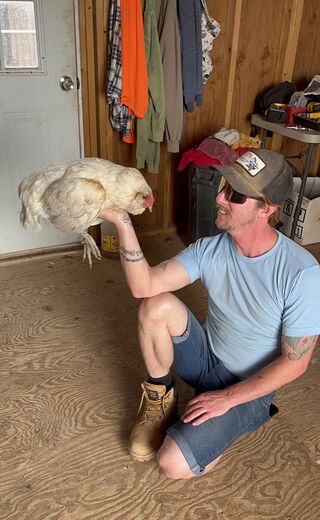 Our son, Kyle, is awesome with my chickens!!