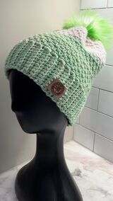 Photo of Green & White Pom Pom Hat