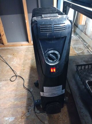 Portable space heater to maintain temperature