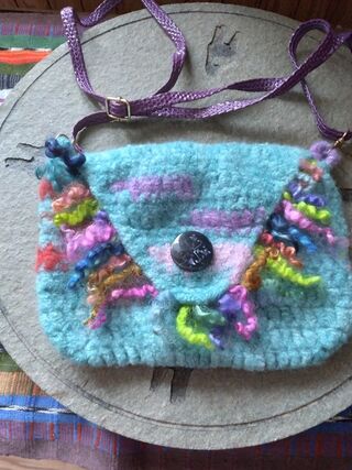 Photo of teal  purse with mohair locks