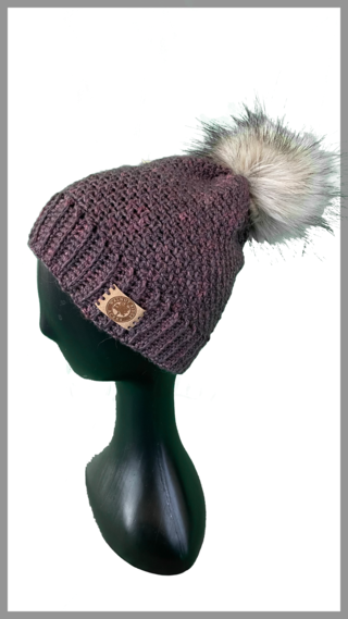 Photo of Child Purple Pom Pom Hat