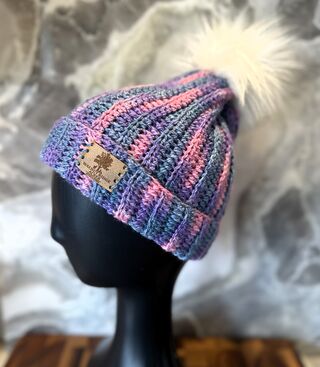 Photo of Child Bright Purple Multi Pom Pom Hat